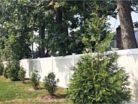 <b>Two toned tan and white vinyl privacy fence 2</b>